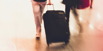 People walking with luggage