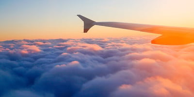 Wing of Plane over Clouds