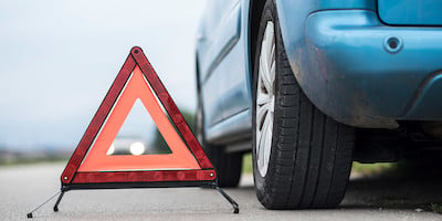 Car with Hazardous Sign