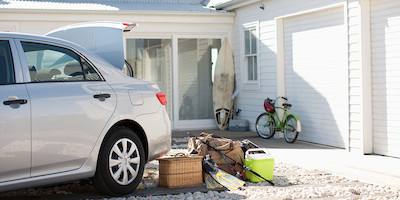 Car in Driveway Being Packed for Trip